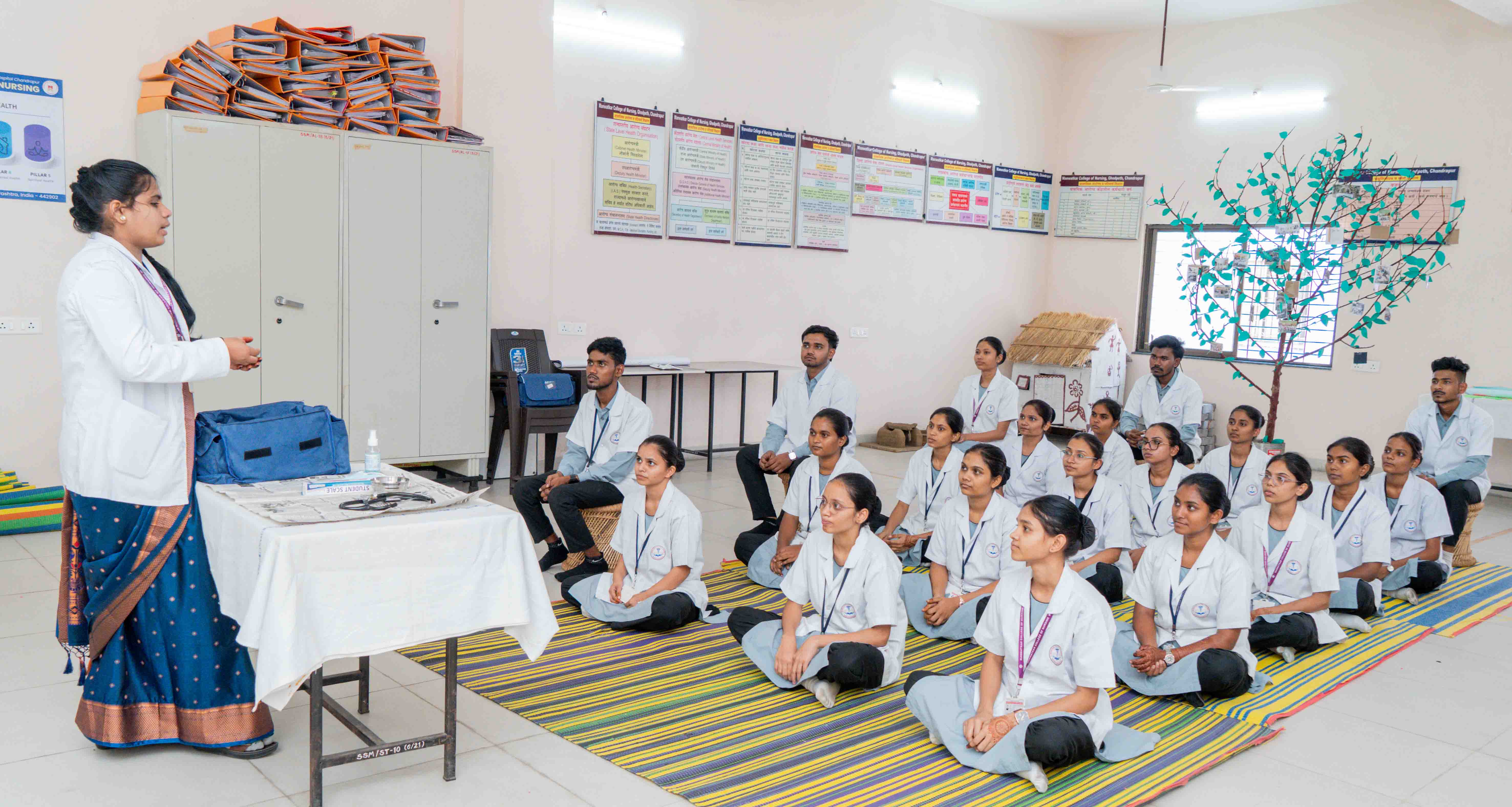 Students performing experiments in the pharmacy laboratory at Manwatkar College of Pharmacy