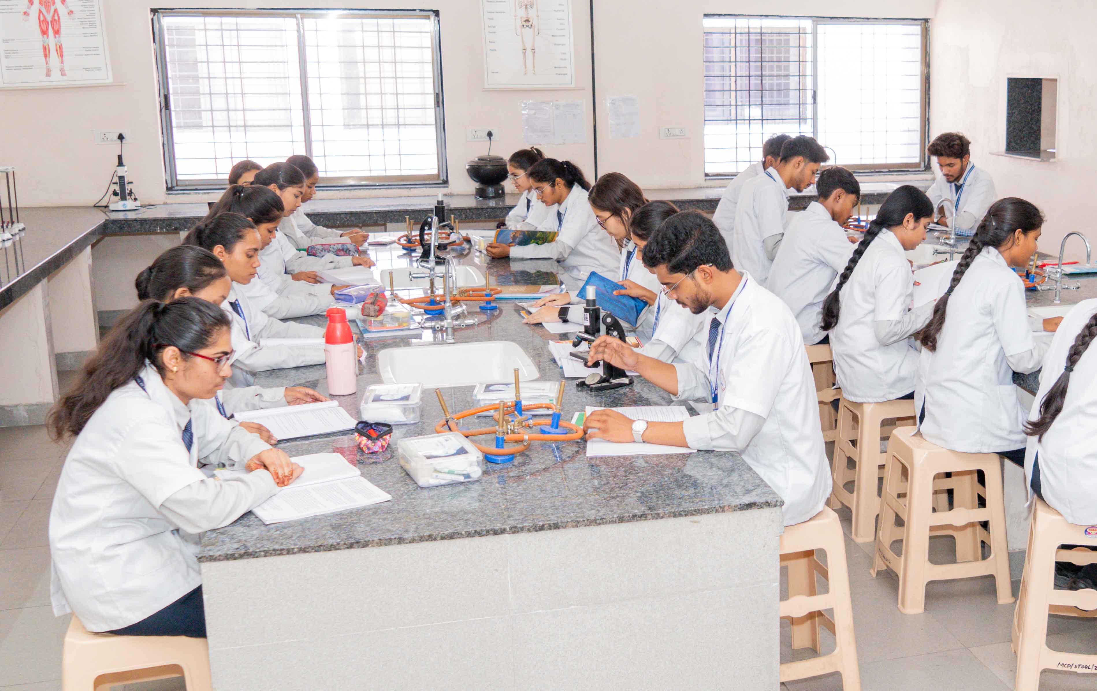 Students studying at Manwatkar College of Pharmacy